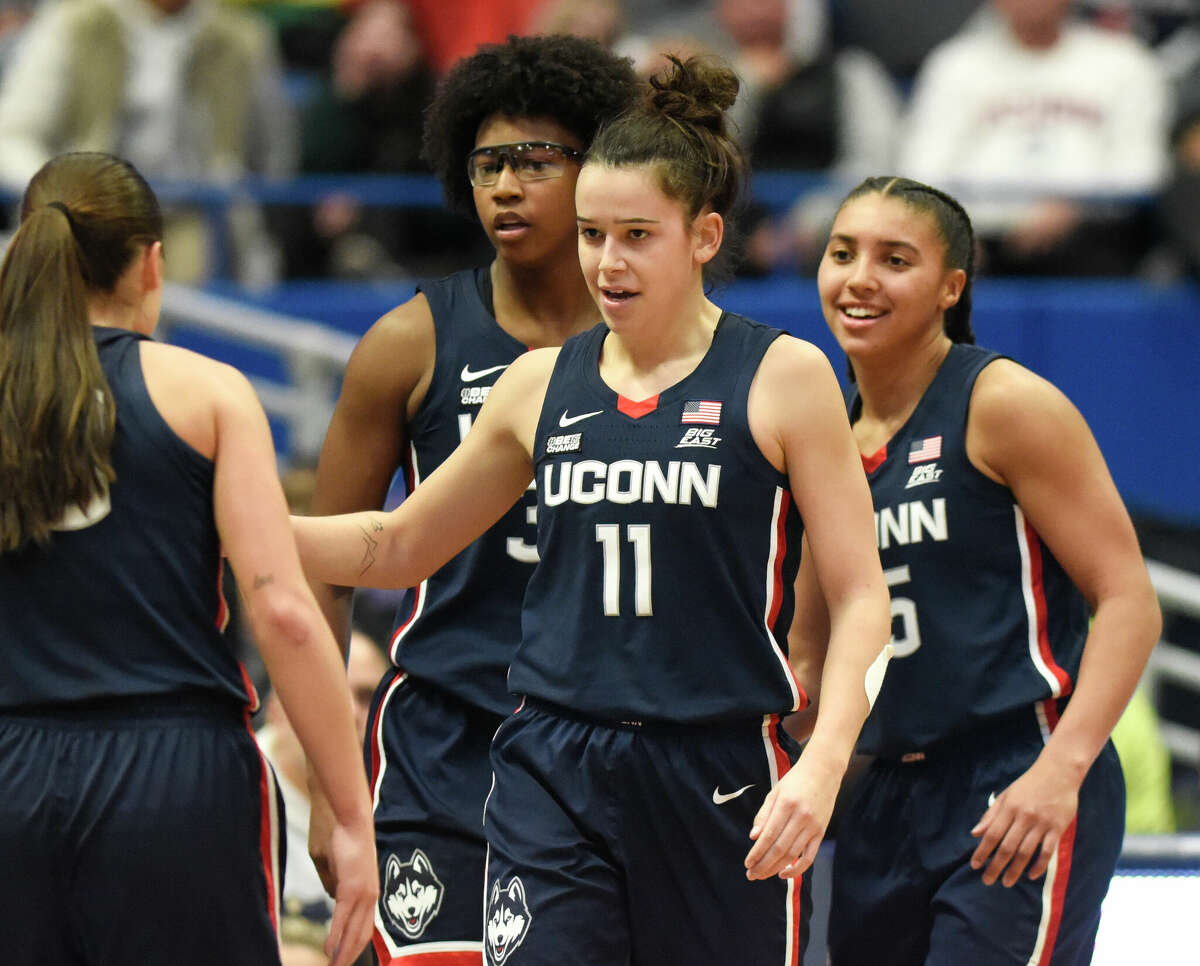 UConn guard Lou Lopez Senechal (11) celebrates during No. 5 UConn's 91-69 win over No. 10 NC State in the NCAA women's college basketball game at the XL Center in Hartford, Conn. Sunday, Nov. 20, 2022.