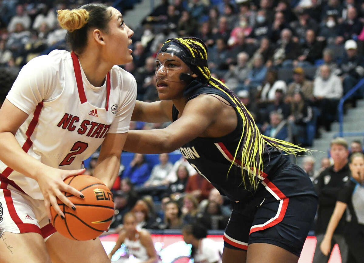 UConn forward Aaliyah Edwards, right, defends NC State's Saniya Rivers in No. 5 UConn's 91-69 win over No. 10 NC State in the NCAA women's college basketball game at the XL Center in Hartford, Conn. Sunday, Nov. 20, 2022.