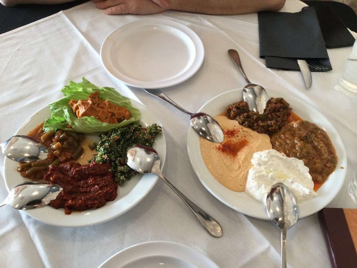 Mezze plates with a variety of Turkish and Mediterranean salads served as appetizers at Nazif's.