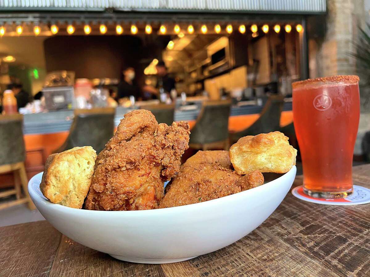 Fried chicken with biscuits and house-brewed beer are part of the Southerleigh Fine Food & Brewery lunch experience at the Pearl in San Antonio.