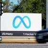 A car passes the Meta logo at the company headquarters in Menlo Park, Calif. Meta is among the tech companies that has had layoffs in recent weeks.