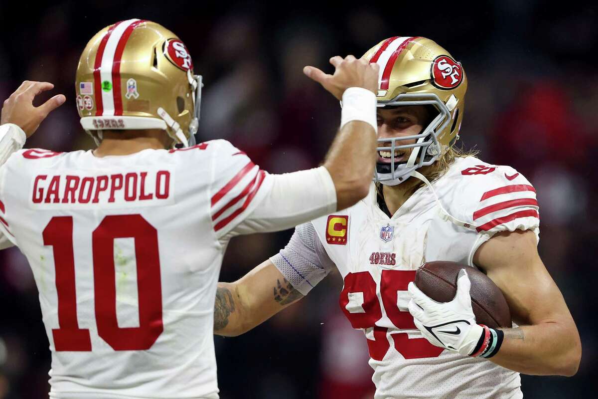 MEXICO CITY, MEXICO - NOVEMBER 21: George Kittle #85 of the San Francisco 49ers celebrates his touchdown with teammate Jimmy Garoppolo #10 during the second quarter against the Arizona Cardinals at Estadio Azteca on November 21, 2022 in Mexico City, Mexico. (Photo by Sean M. Haffey/Getty Images)