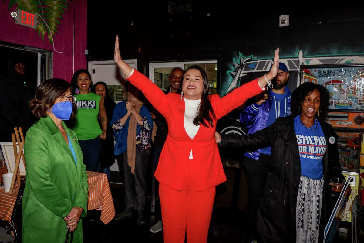 Oakland Mayor-elect Sheng Thao, who overcame homelessness, greets supporters on election night.
