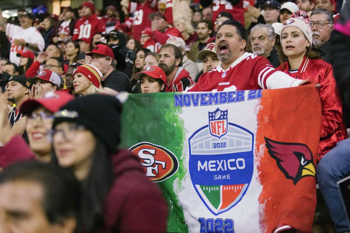 MEXICO CITY, MEXICO - NOVEMBER 21: Football fans cheer during the San Francisco 49ers vs Arizona Cardinals football game at the Estadio Azteca in Mexico City, Mexico on November 21, 2022.