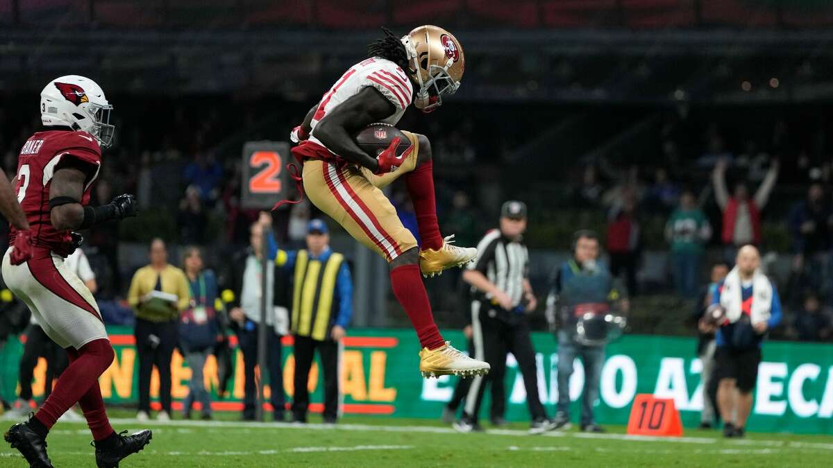 Brandon Aiyuk scores a second-half touchdown against the Cardinals on Monday in Mexico City. 