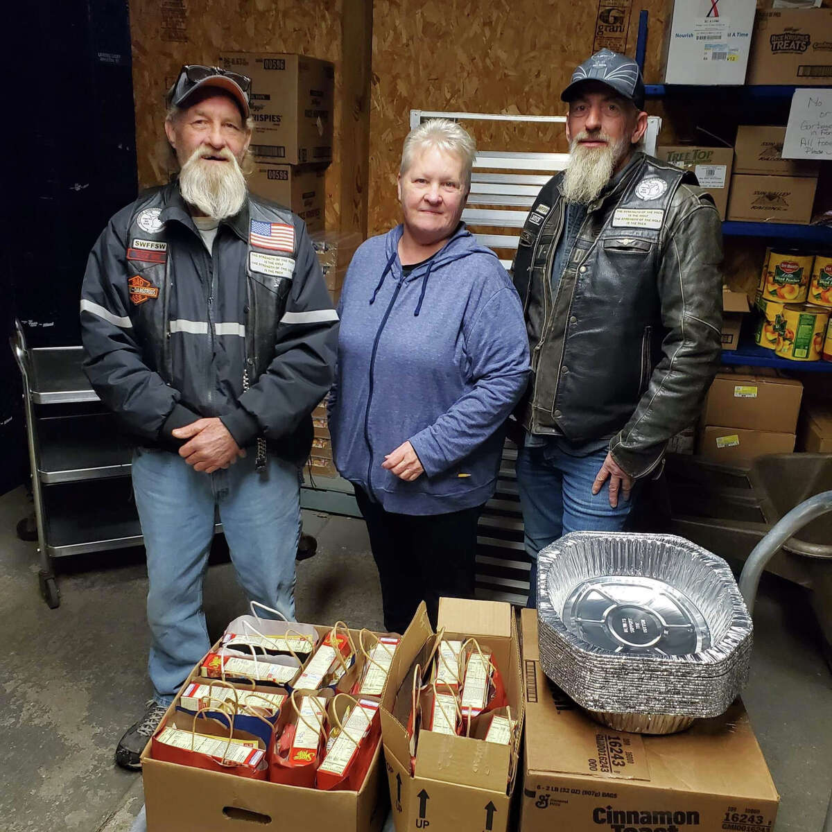 The Sawtooth Wolves Motorcycle Club, of Barryton, works with Fate's Market and other local businesses to provide Thanksgiving dinners to families in need.