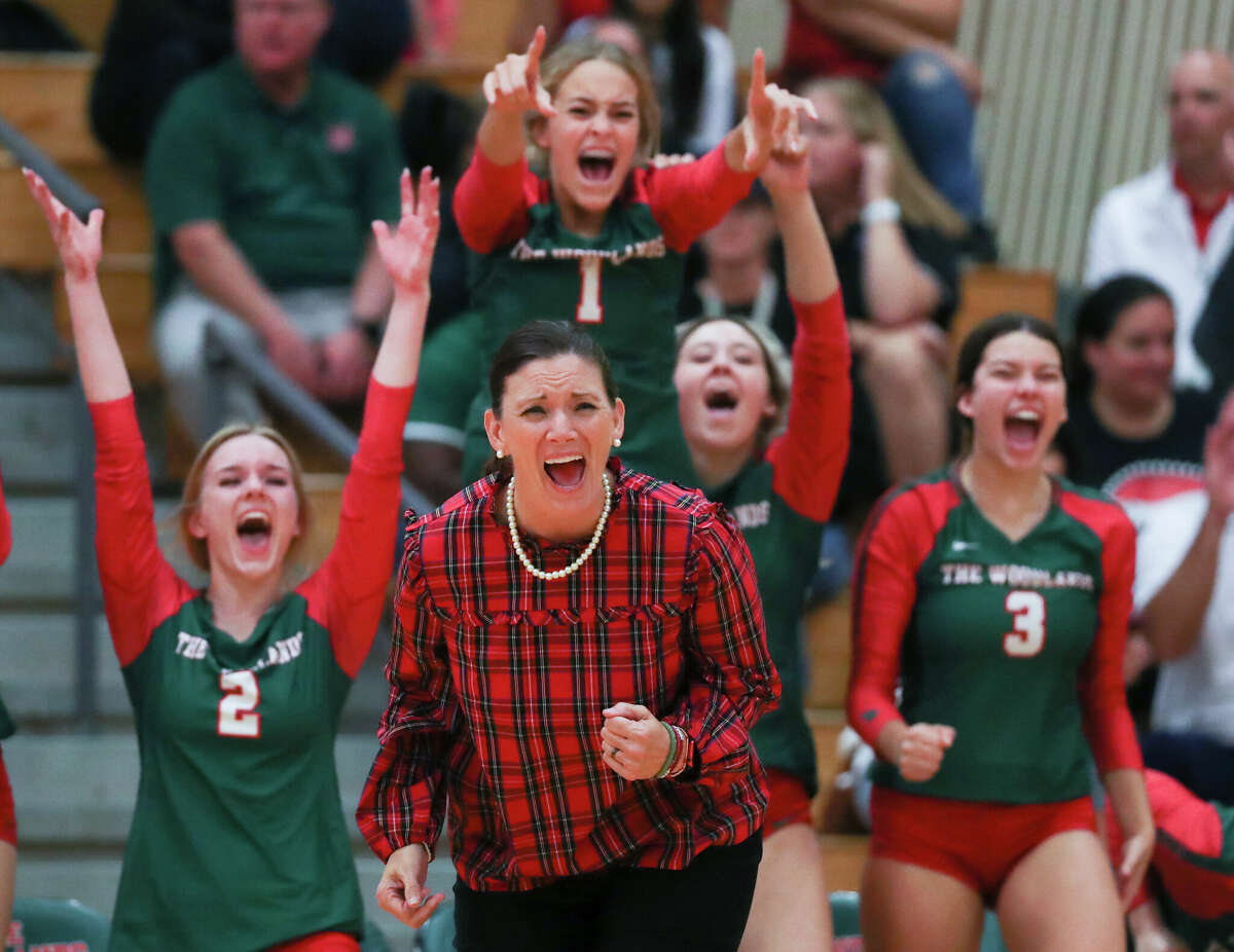 The Woodlands Terri Wade reacts after an ace by outside hitter Makenzie Weddel in the fifth set during a Region II-6A quarterfinal volleyball match at The Woodlands High School, Tuesday, Nov. 8, 2022, in The Woodlands.