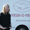 Person to Person CEO Nancy Coughlin poses during an event at the East Norwalk Association Library in Norwalk, Conn. Tuesday, Nov. 22, 2022.