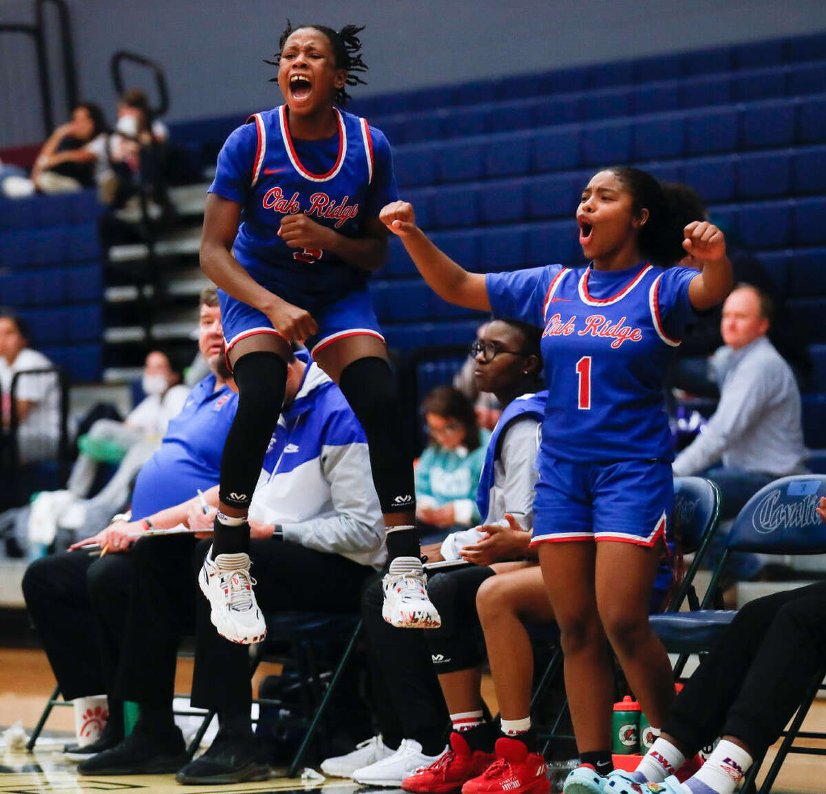 Oak Ridge small forward Chioma Emeh (3) cheers during a high school basketball game at College Park High School, Wednesday, Feb. 9, 2022, in The Woodlands.