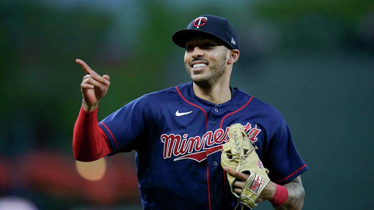 Carlos Correa of the Minnesota Twins celebrates after he caught the News  Photo - Getty Images