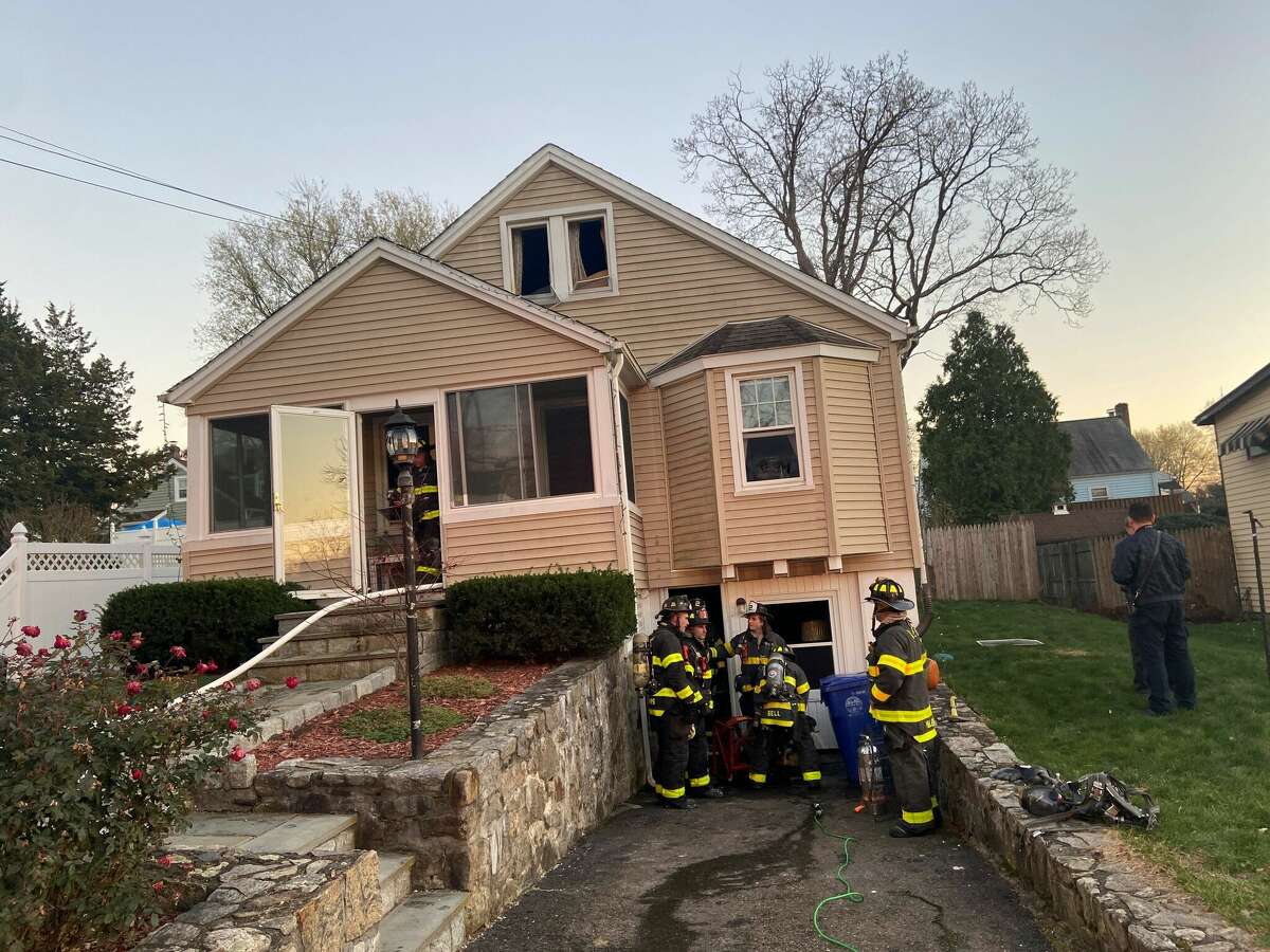 A Norwalk house fire killed one of two dogs and caused extensive damage to the home Tuesday, according to Norwalk fire officials.