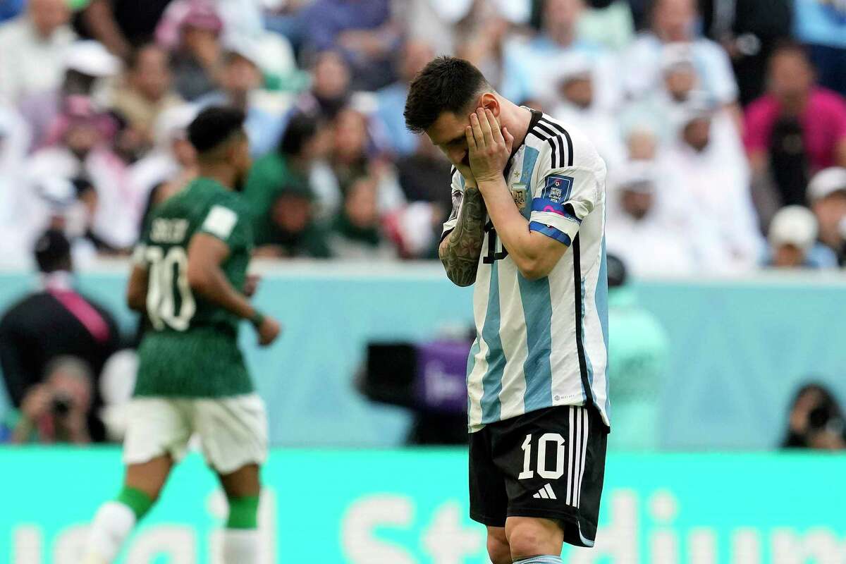 Argentina's Lionel Messi reacts disappointed during the World Cup group C soccer match between Argentina and Saudi Arabia at the Lusail Stadium in Lusail, Qatar, Tuesday, Nov. 22, 2022. (AP Photo/Natacha Pisarenko)