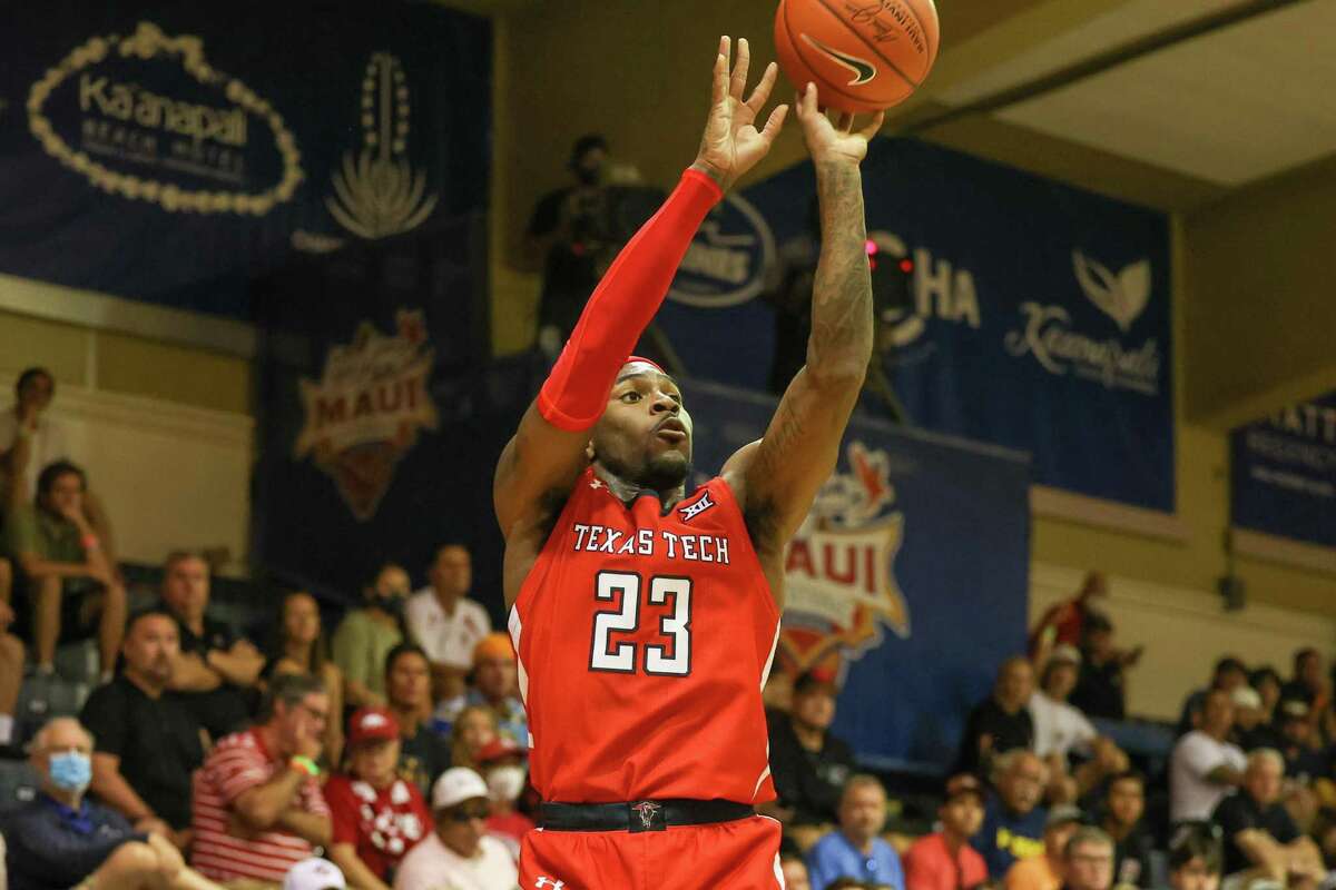 LAHAINA, HI - NOVEMBER 22: De'Vion Harmon #23 of the Texas Tech Red Raiders shoots a jump shot in the first half of the game against the Louisville Cardinals during the Maui Invitational at Lahaina Civic Center on November 22, 2022 in Lahaina, Hawaii. (Photo by Darryl Oumi/Getty Images)