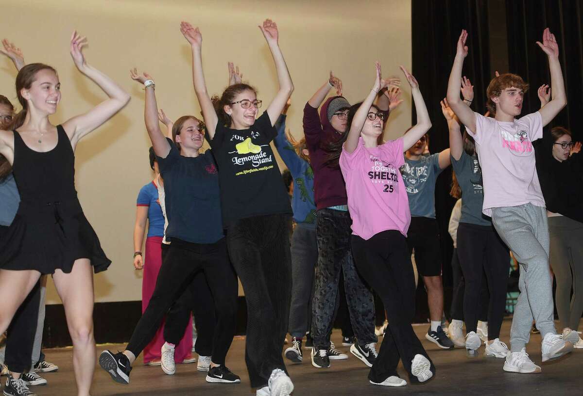 The Shelton High Drama Club's musical revue Adaptations rehearses the opening group dance number from their upcoming production at Shelton High School in Shelton, Conn. on Tuesday, November 22, 2022.