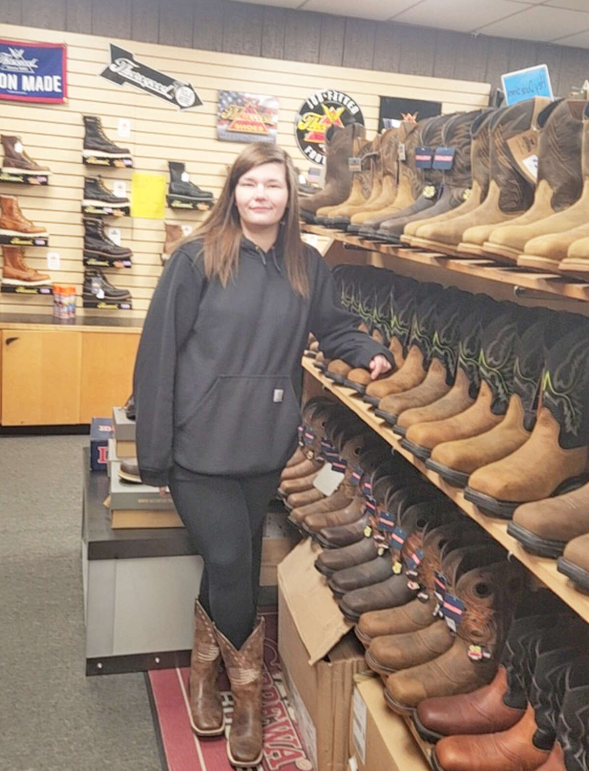 Whether at her job or at home in Troy with her 7-year-old son, Nicole Lanahan is a believer in community service. She works for London Shoe Shop in Collinsville.