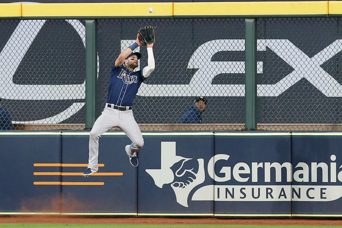 Kevin Kiermaier #39 of the Tampa Bay Rays makes a catch against the Houston Astros during the fourth inning in game one of the American League Division Series at Minute Maid Park on October 04, 2019 in Houston, Texas. (Photo by Tim Warner/Getty Images)