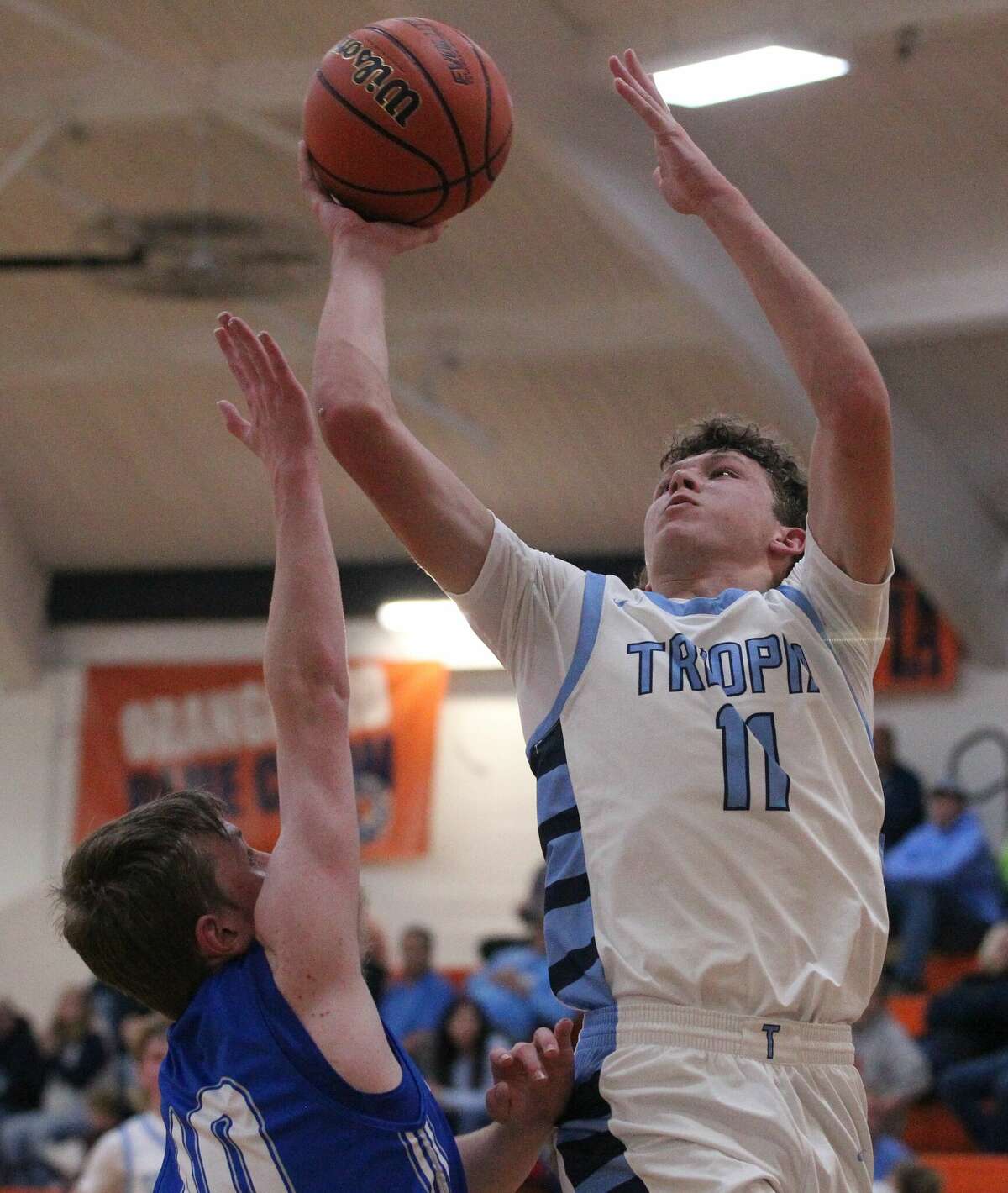 Action from the Triopia boys' basketball team's win over Springfield Lutheran at the Gene Bergschneider Turkey Tournament Tuesday night in New Berlin