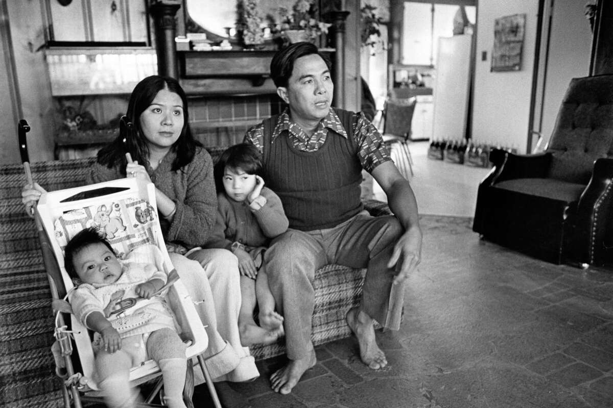 03/1981 - Nguyen Van Nam, a spokesman for refugee fishermen in the Galveston Bay area, and his wife, Nguyen An Tung, consider the United States their second country and themselves Vietnamese-Americans. Their children, Trang Dai T. Nguyen, 4, and Traing Mai T. Nguyen, 3 months, were born in Texas.
