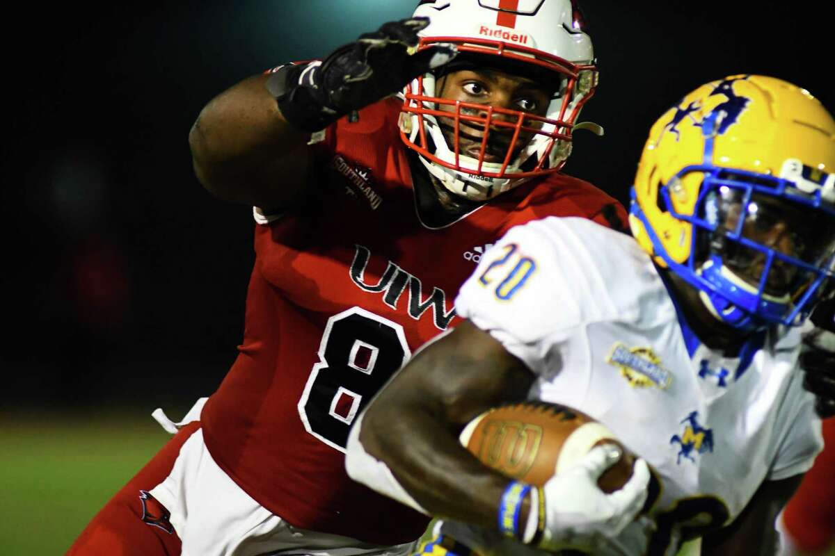 Incarnate Word Cardinals linebacker Kelechi Anyalebechi (8) chased down McNeese State running back Deonta McMahon (20) during the third quarter of Saturday’s conference game at Benson Stadium.