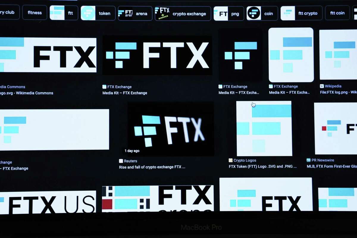 The FTX logo is seen on a computer screen. Binance, the world’s largest cryptocurrency firm, agreed to acquire FTX, another large cryptocurrency exchange, in a rushed sale in order to prevent a liquidity crisis, which is known as the "Lehman Moment" in the crypto industry.