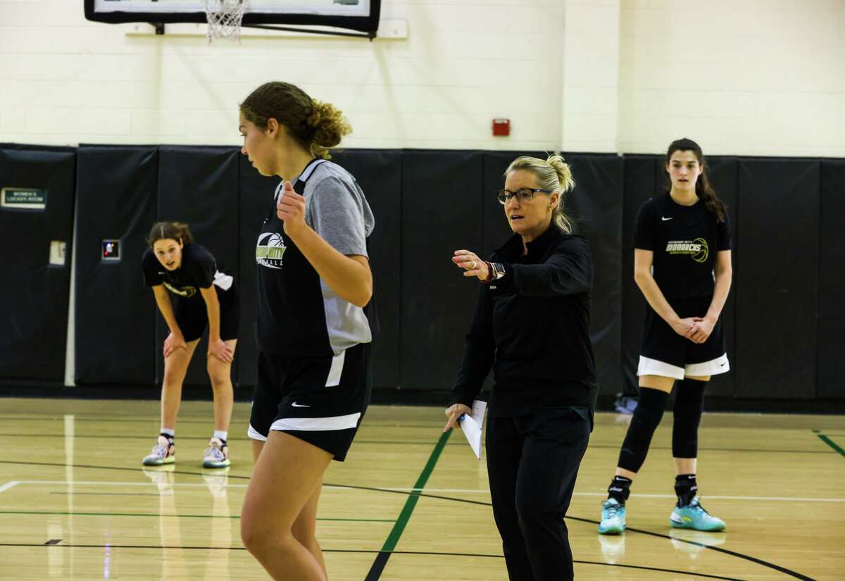 Sue Phillips, head girls basketball coach at Archbishop Mitty High School, instructs her players during practice on Wednesday, November 16, 2022, in San Jose, Calif. Phillips, who is in her 30th season as head coach of the Monarchs, was recently inducted into the San Jose sports Hall of Fame and is a finalist for the women's basketball Hall of Fame.