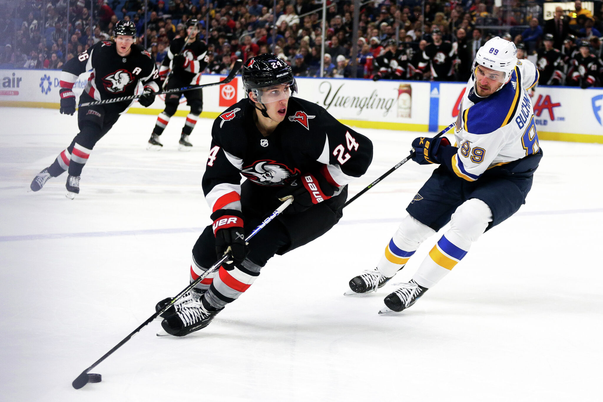 Buffalo Sabres center Dylan Cozens (24) skates wearing a Hockey