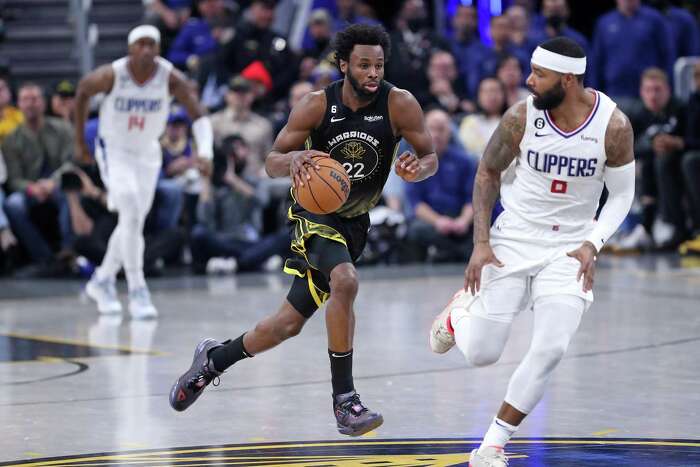 FILE - Golden State Warriors forward Jonathan Kuminga stands on the court  during the second half of an NBA basketball game against the Los Angeles  Clippers Monday, Feb. 14, 2022, in Los