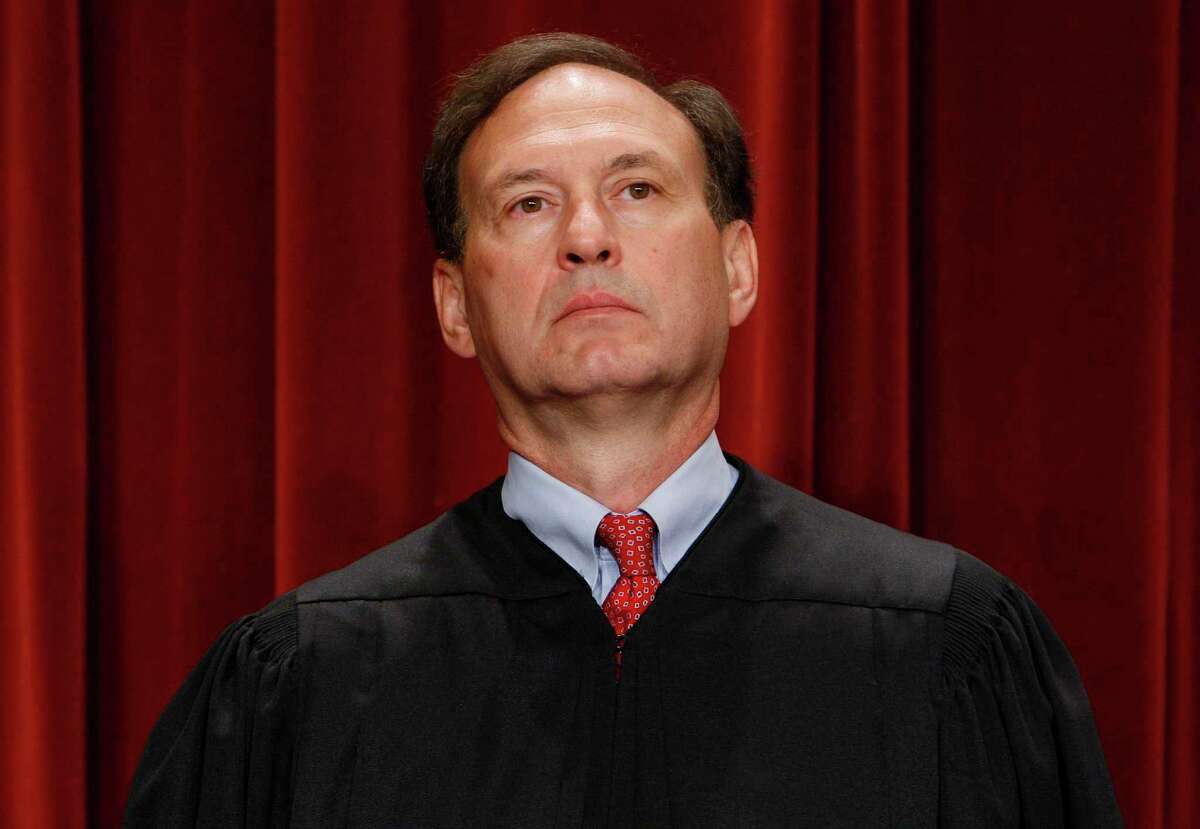 Associate Justice Samuel Alito Jr. sits for a new group photograph, Tuesday, Sept. 29, 2009, at the Supreme Court in Washington. (AP Photo/Charles Dharapak)
