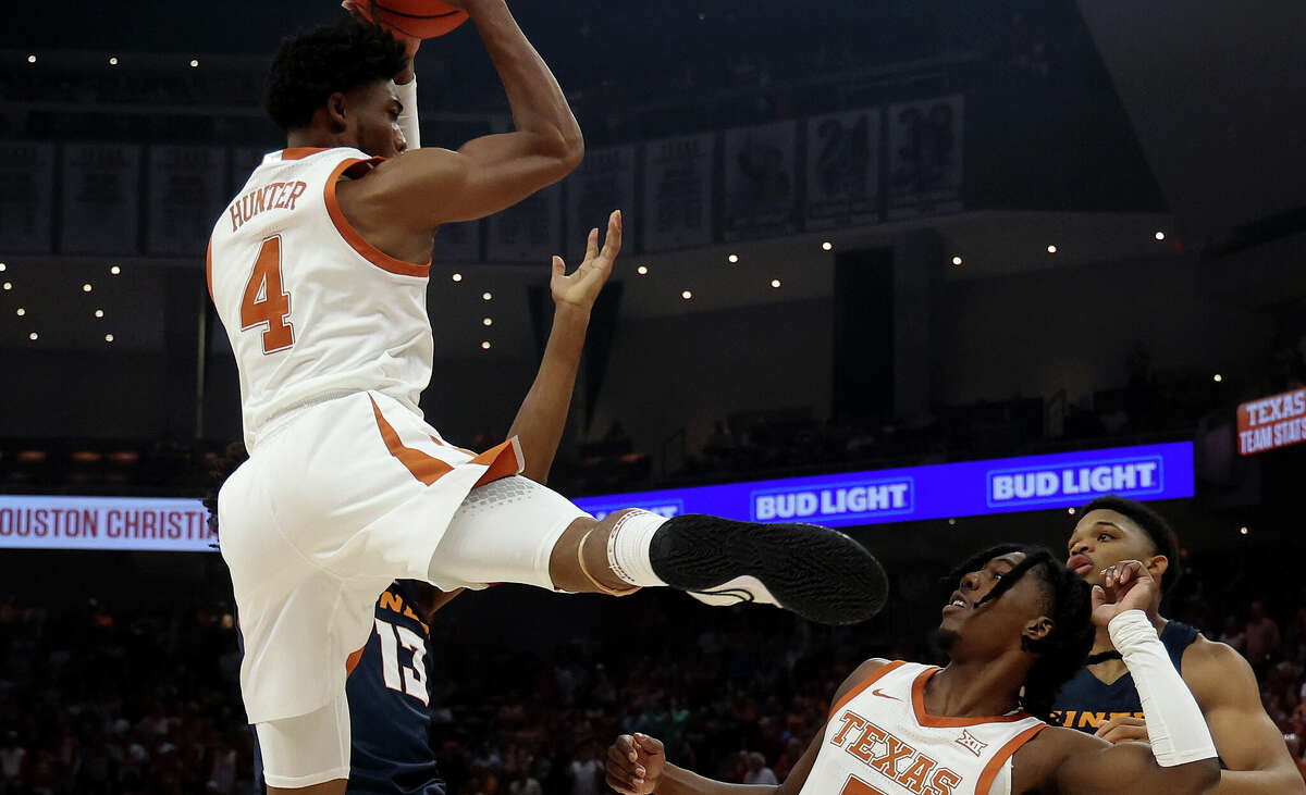 The dynamic between super senior Marcus Carr, right, and sophomore transfer Tyrese Hunter works well for the Longhorns. 