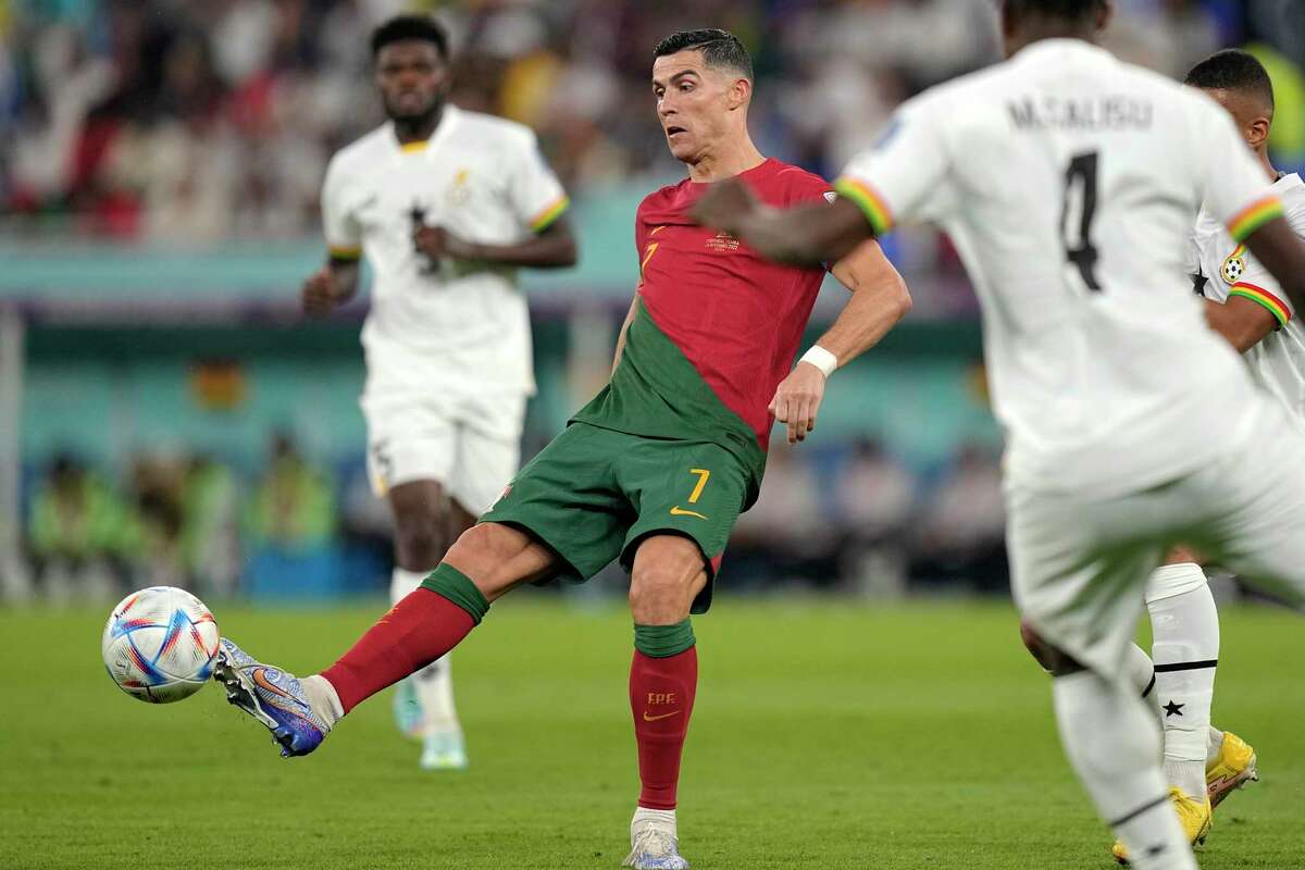Portugal's Cristiano Ronaldo controls the ball during the World Cup group H soccer match between Portugal and Ghana, at the Stadium 974 in Doha, Qatar, Thursday, Nov. 24, 2022.