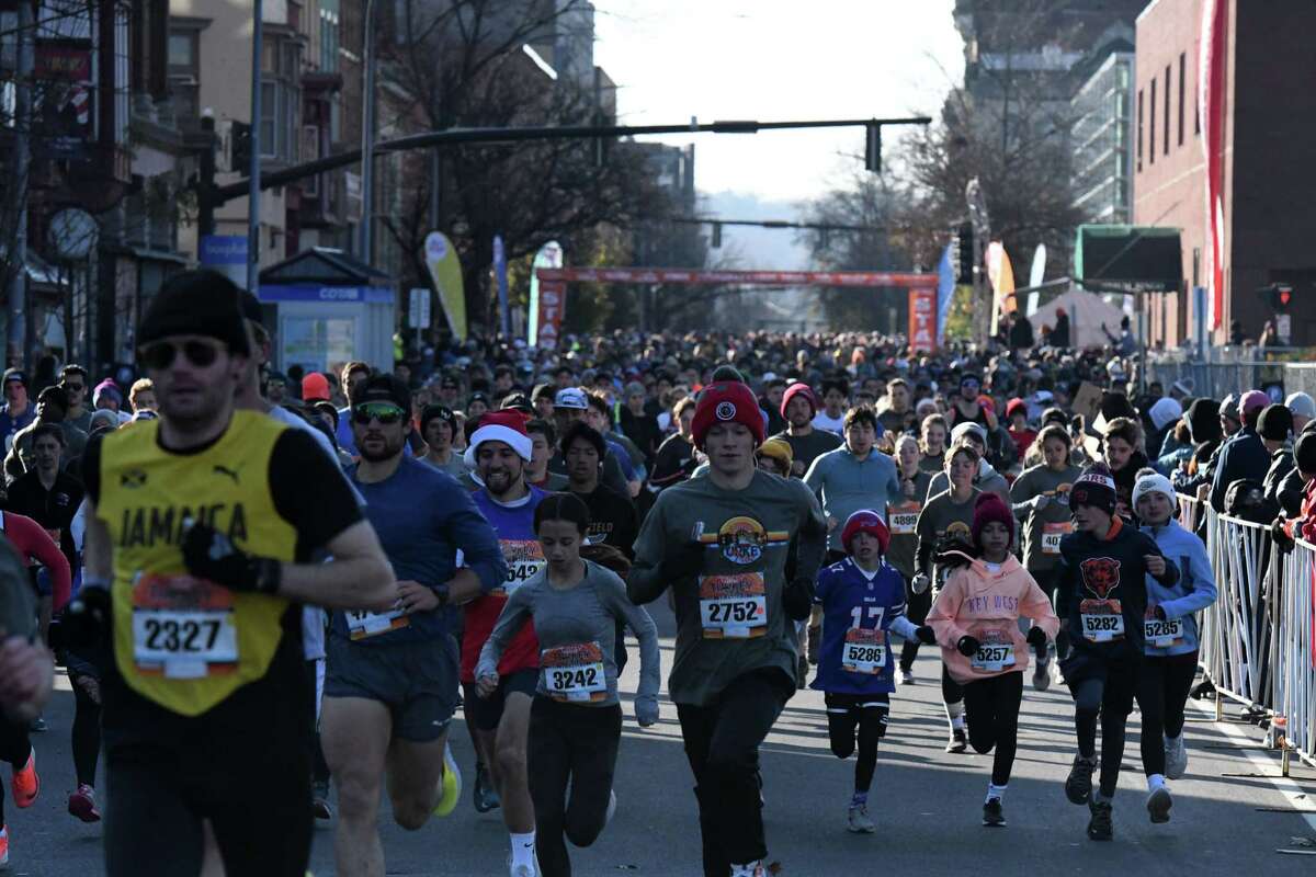 Troy Turkey Trot runners start the 5k race on Thursday morning, Nov. 24, 2022, in Troy, N.Y.