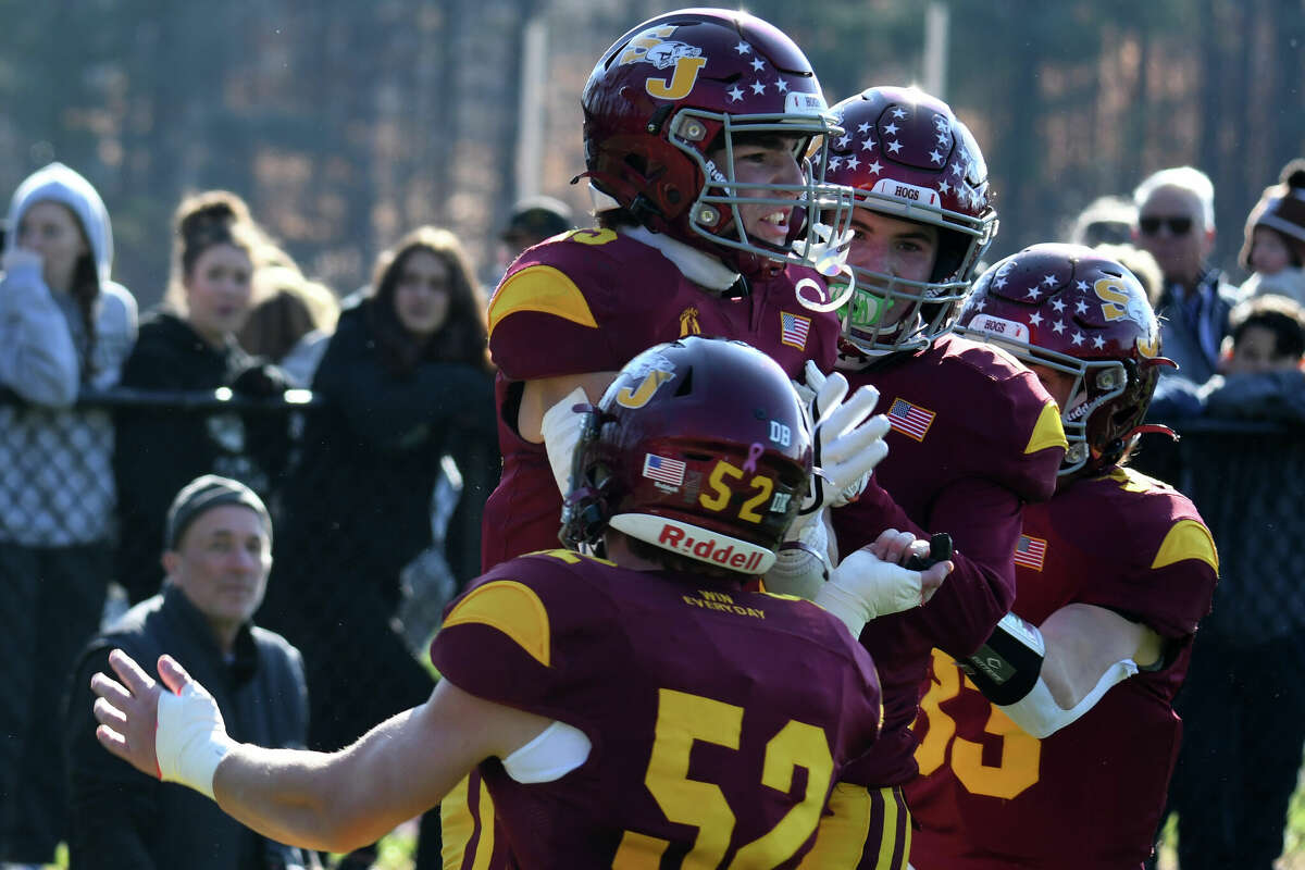 St. Joseph's Mickey Covino celebrates his touchdown catch during a football game between St. Joseph and Trumbull at Dalling Field, Trumbull on Thursday, Nov. 24, 2022.