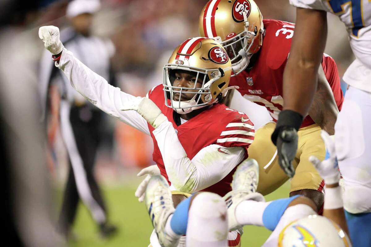 San Francisco 49ers’ Jimmie Ward celebrates a tackle against Los Angeles Chargers during NFL game at Levi’s Stadium in Santa Clara, Calif., on Sunday, November 13, 2022.