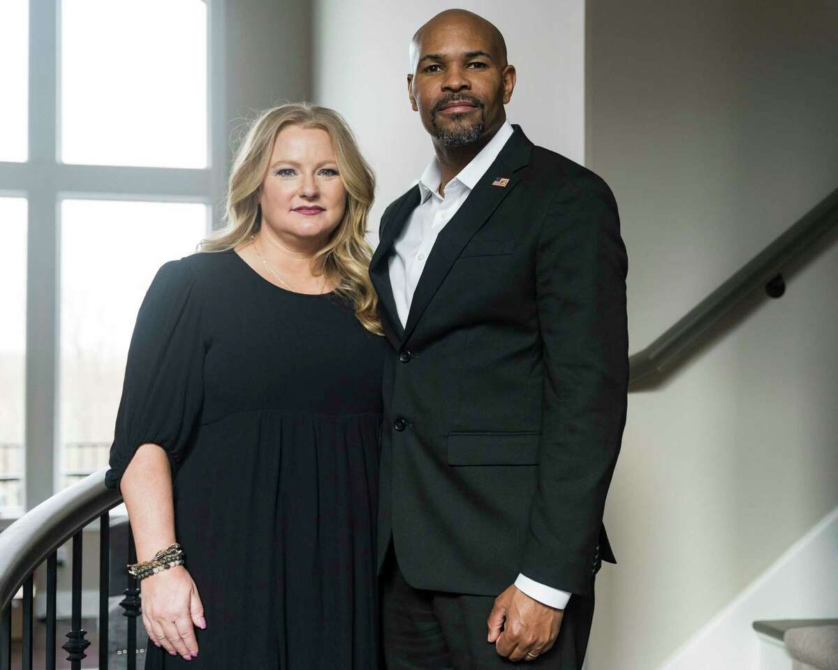 Lacey Adams and former surgeon general Jerome Adams at their suburban Indianapolis home this month. As Lacey fights melanoma, the couple works to educate people on skin cancer, but they have had an unwelcome response.