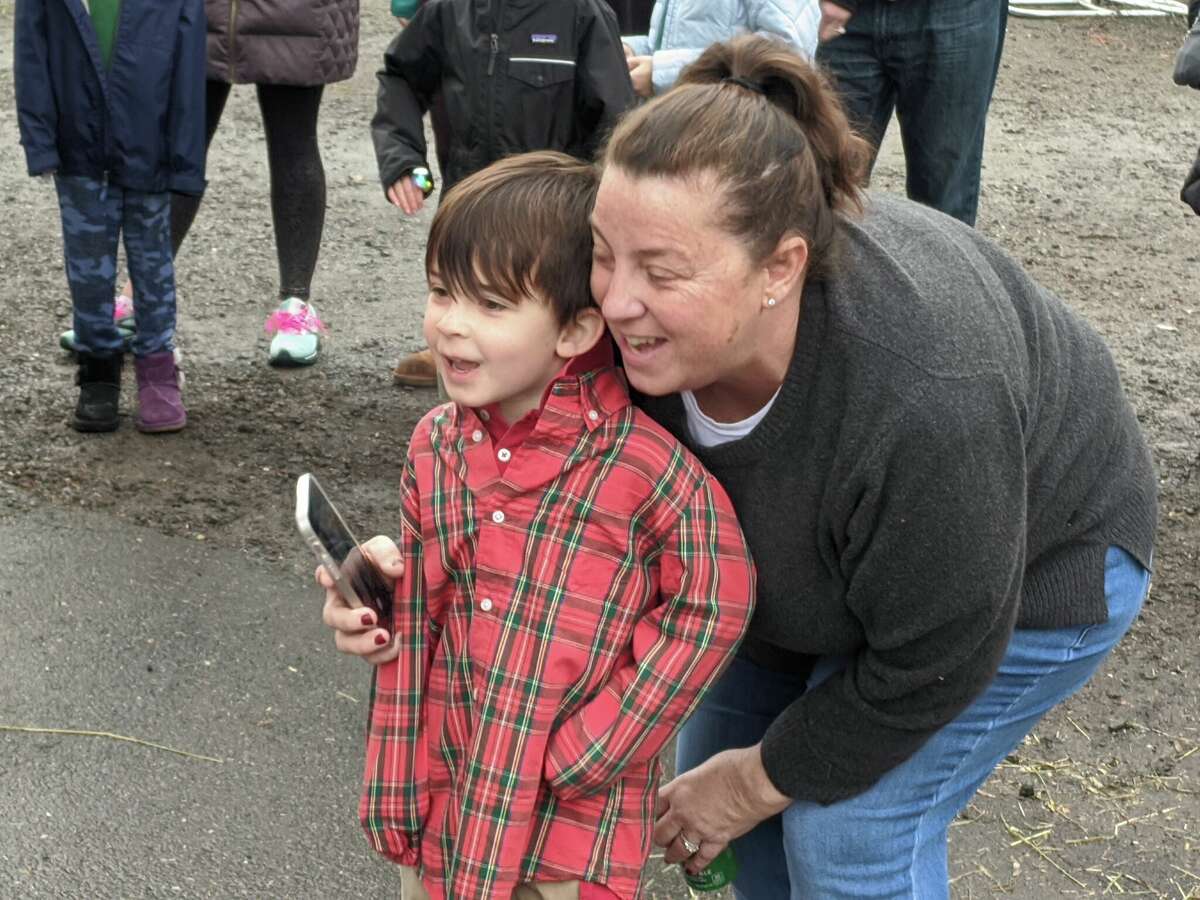 Jena Palmer and her six-year-old son Wes were among the many who were very excited for Santa's noon arrival at the Reindeer Festival.
