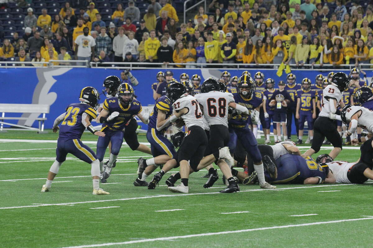 Ubly's Parker Peruski (#68) sets up a block in the state championship game.