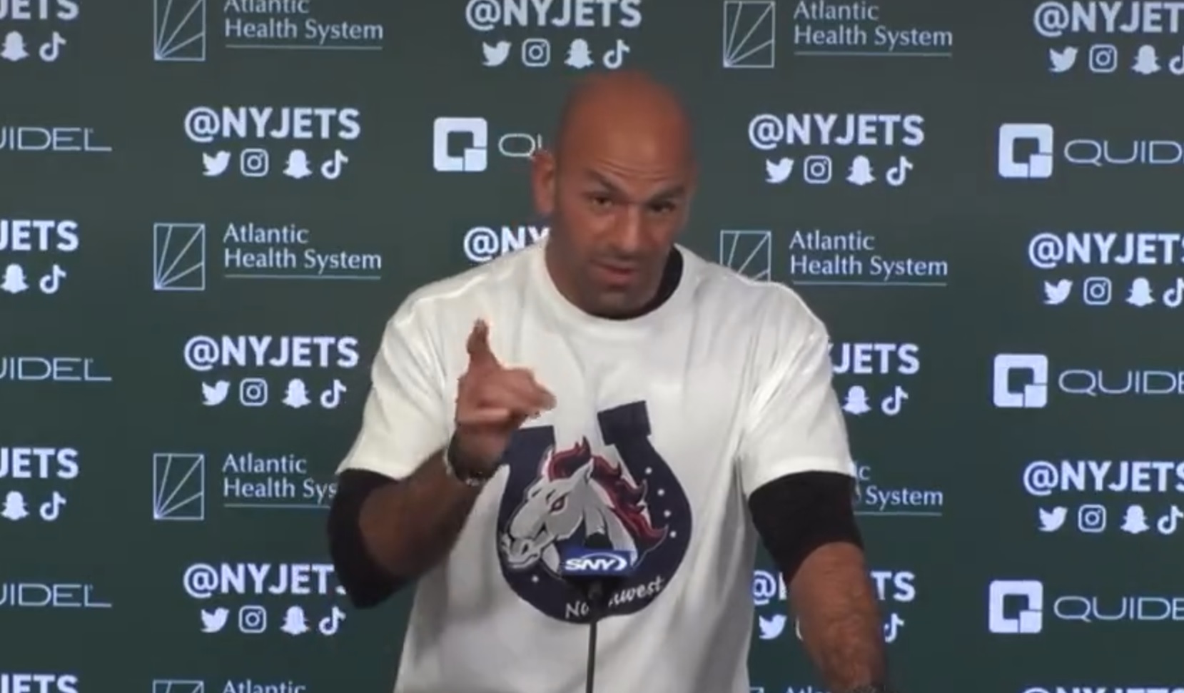 NY Jets head coach wears West Hartford's Hall High shirt