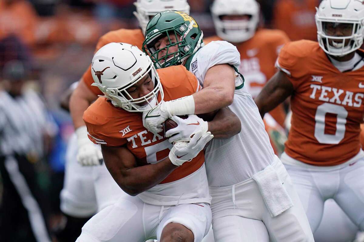 No. 23 Texas keeps Big 12 championship game hopes alive with win over