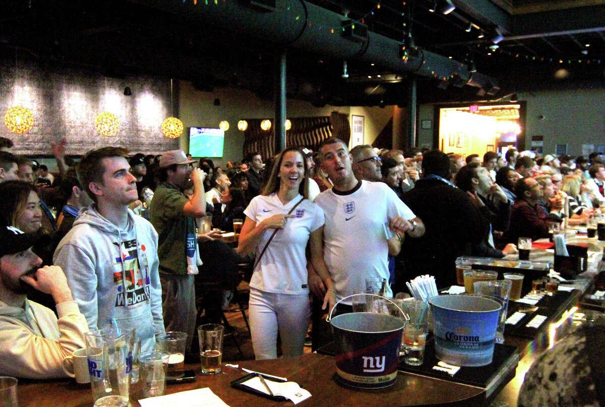 Fans World Cup soccer action between the US and England being broadcast at Bobby V's Restaurant & Sports Bar in downtown Stamford, Conn., on Friday November 25, 2022.