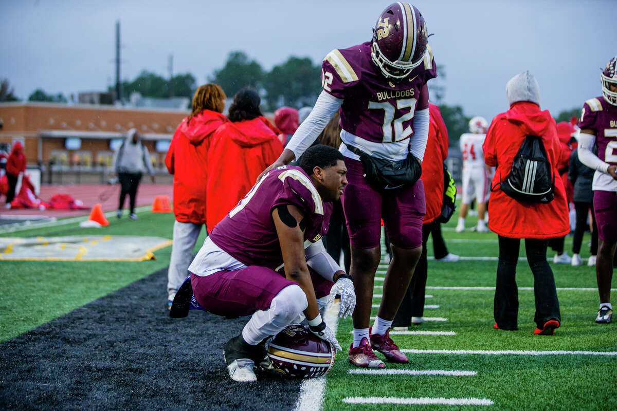 Summer Creek OL Christian Crockett (71) reacts on the field with OL Cheikh Sall (72) after a high school football playoffs Region III-6A Division II semifinal game. Katy vs. Summer Creek at Turner Stadium, Friday, November 25, 2022, in Humble. Katy defeated Summer Creek 35-7.