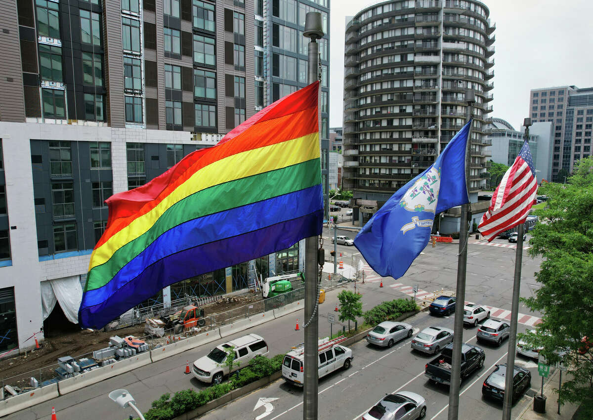 A rainbow flag flies outside the Government Center in Stamford, Conn., on June 2, 2022. 