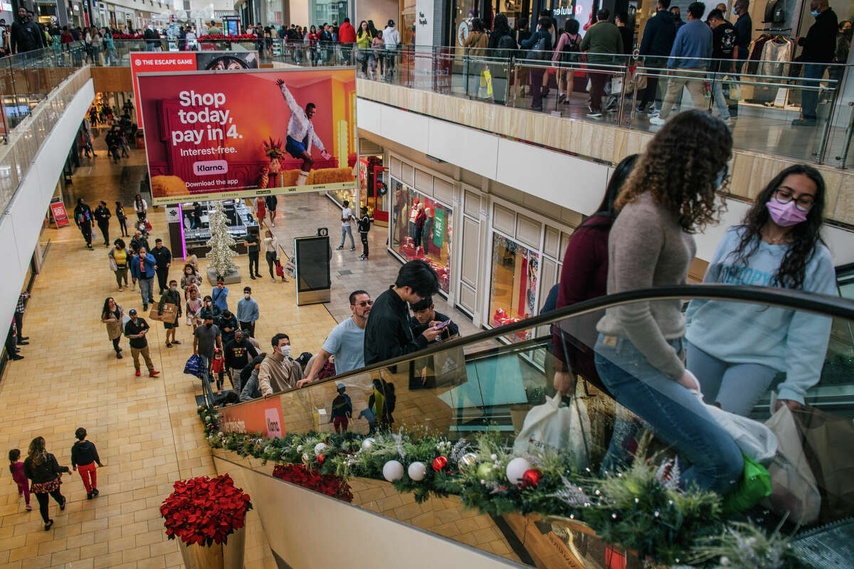 People shop in The Galleria mall during Black Friday on November 26, 2021 in Houston, Texas.