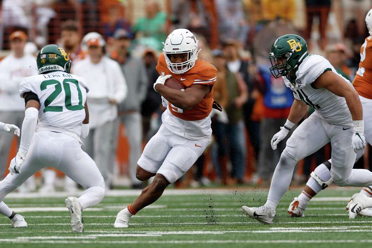 Bijan Robinson and Texas beat Baylor on Friday. Robinson could be leaving for the NFL after rushing for 1,580 yards in the regular season.