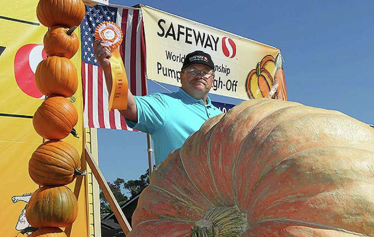 HALF MOON BAY, CA - OCTOBER 11: Ron Root of Citrus Heights, California celebrates after winning the 37th Annual Safeway World Championship Pumpkin Weigh-Off with his 1,535 pound pumpkin on October 11, 2010 in Half Moon Bay, California. Ron Root won the competition with a 1,535 pound pumpkim and took home $9,210 in prize money equal to $6 a pound. (Photo by Justin Sullivan/Getty Images) *** Local Caption *** Ron Root
