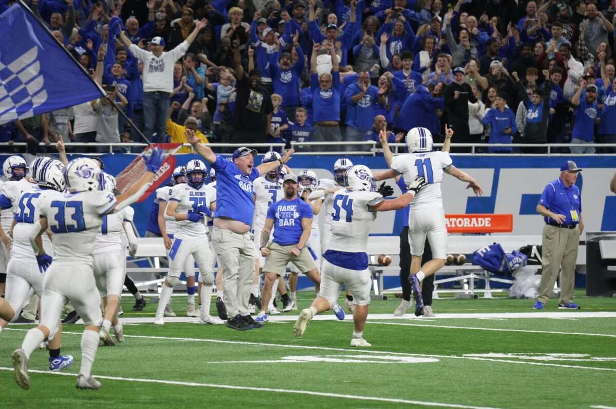 Gladwin's Treyton Siegert celebrates after kicking a 21-yard field goal to give the Flying G's the lead in the final seconds of Saturday's Division 5 state championship game against Frankenmuth at Ford Field in Detroit, Nov. 26, 2022.