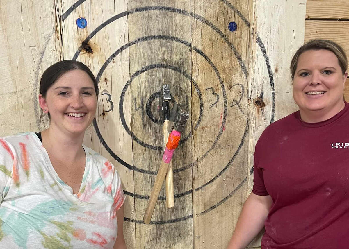 Kristyn Muller Mirasol, left, is headed to Appleton, Wis., Dec. 1-4, 2022, to compete in the 2022 Signarama World Axe Throwing Championships. She qualified for Big Axe and Duals with Suzie Bassett of Virginia. (Kristyn Mirasol photo)