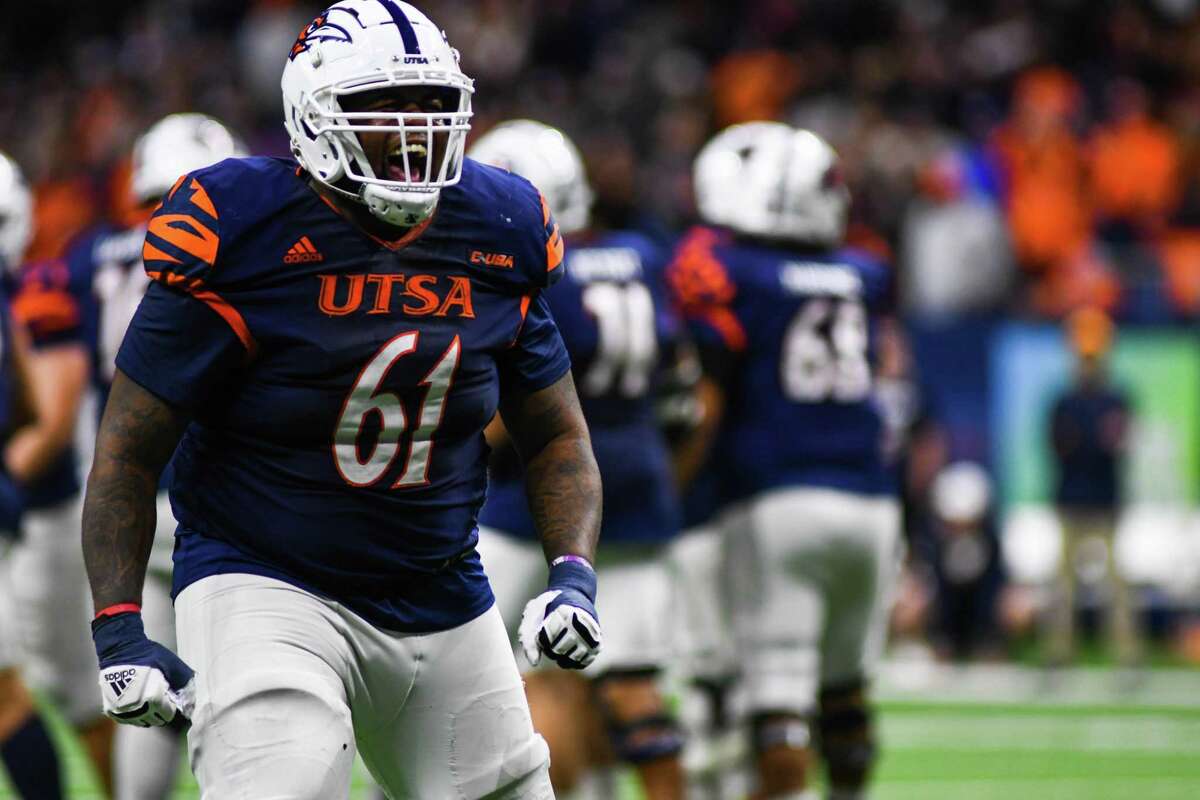UTSA offensive lineman Kevin Davis (61) celebrates after UTSA kicked a field goal with seven seconds left in Saturday’s Conference USA game against UTEP at the Alamodome.