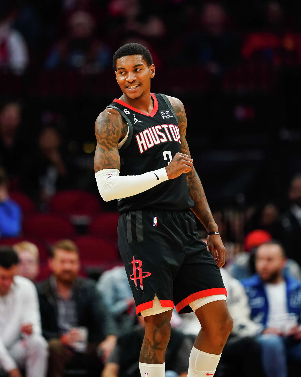 HOUSTON, TEXAS - NOVEMBER 26: Kevin Porter Jr. #3 of the Houston Rockets reacts after a play during the first quarter of the game against the Oklahoma City Thunder at Toyota Center on November 26, 2022 in Houston, Texas. NOTE TO USER: User expressly acknowledges and agrees that, by downloading and or using this photograph, User is consenting to the terms and conditions of the Getty Images License Agreement. (Photo by Alex Bierens de Haan/Getty Images)