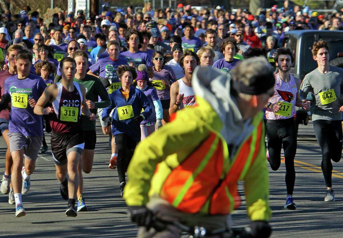 In photos: Turkey Trot hits the streets in town in support of the ...