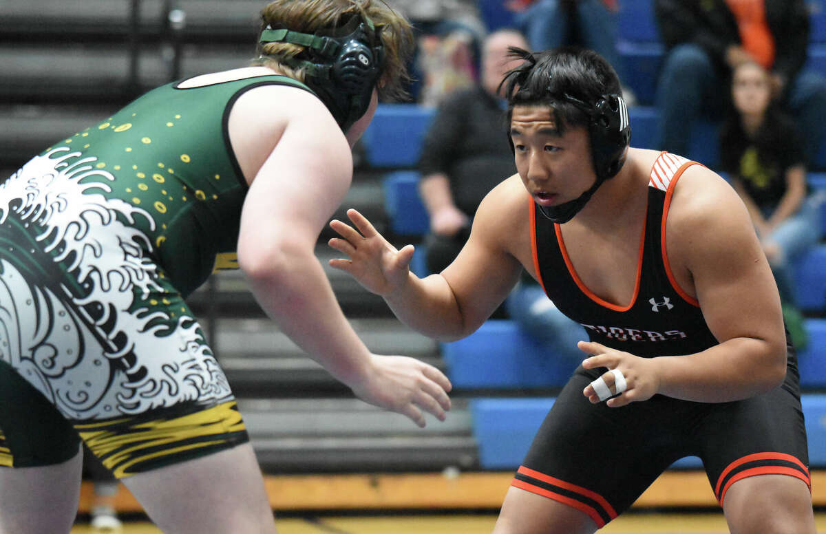 Edwardsville's Evan McCormick lines up his Mahomet-Seymour opponent during the O'Fallon Duals on Saturday in O'Fallon.